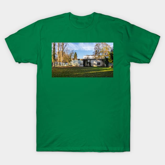 Old abandoned building in a park surrounded by nature and sunlight T-Shirt by KargacinArt